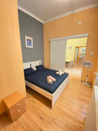 Ένα ή περισσότερα κρεβάτια σε δωμάτιο στο Chocolate in the hearth of Budapest