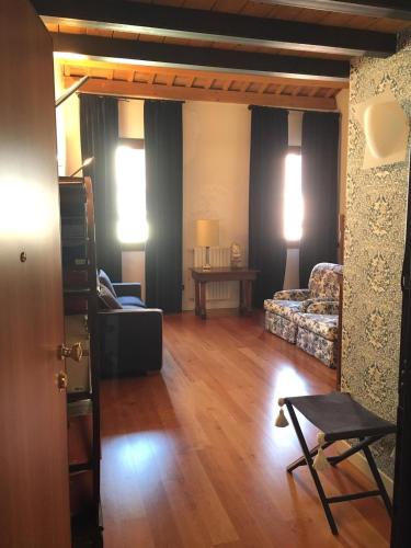 a living room with a couch and a table at Ciao Amore in Padova