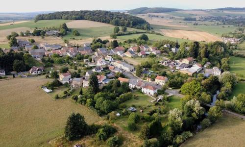 an aerial view of a small village in a field at Les gîtes Saint-Aignan in Saint-Aignan