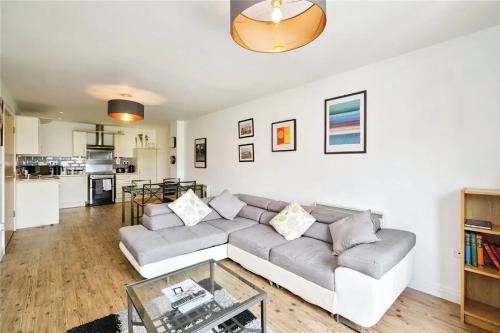 a living room with a couch and a table at City Centre Apartment Jewellery Quarter in Birmingham