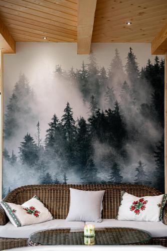 a mural of a forest on a wall at Chałupa na wsi u Papierzy Sauna, Jacuzzi, SPA in Witów