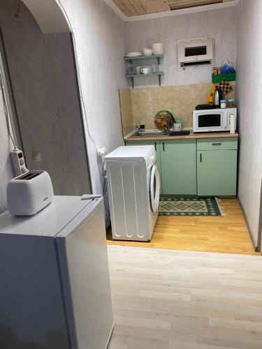 Kuchyň nebo kuchyňský kout v ubytování guesthouse NENO