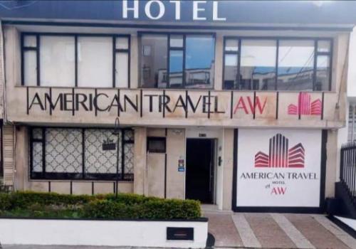 a hotel with a sign on the front of it at AW Hotel American Travel in Bogotá