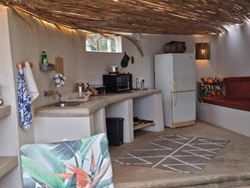 Kuchyň nebo kuchyňský kout v ubytování Surf Cottage Ifafa