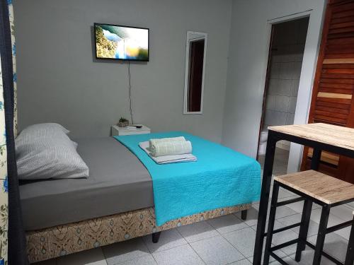 Un ou plusieurs lits dans un hébergement de l'établissement Apartahotel los cactus