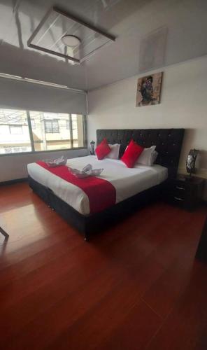 Кровать или кровати в номере AW Hotel American Travel