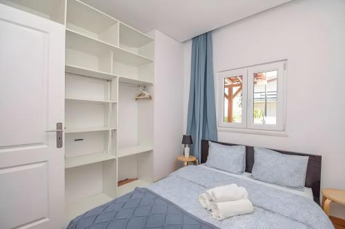 Postel nebo postele na pokoji v ubytování Casinha da Parede - 5 min from the beach