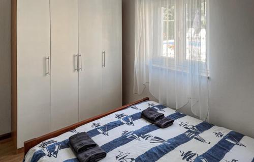Tempat tidur dalam kamar di Villa Leona