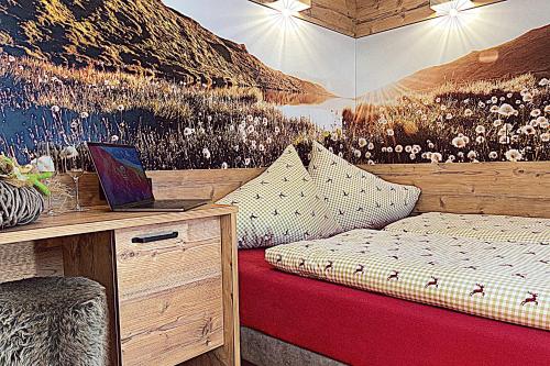 Postel nebo postele na pokoji v ubytování Pircher-Maes Apart & Stubaital