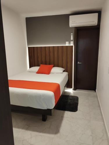 Ένα ή περισσότερα κρεβάτια σε δωμάτιο στο Hotel Cermar Plaza