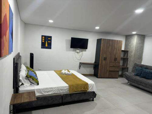 Ένα ή περισσότερα κρεβάτια σε δωμάτιο στο Confortable Aparta Loft 903 Aiana Verde