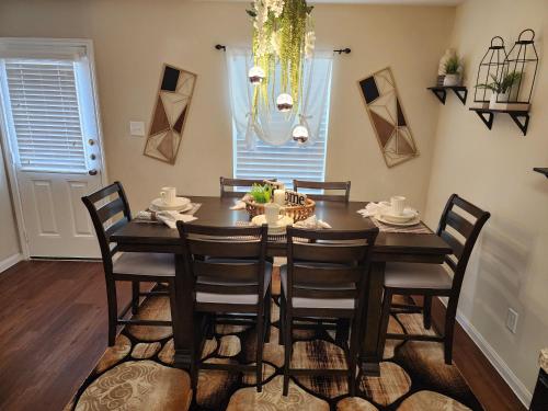 a dining room with a table and chairs at Laribond's Place Houston Texas in Houston
