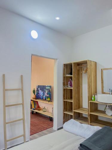 Ένα ή περισσότερα κρεβάτια σε δωμάτιο στο Cosy Studio