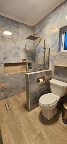 Un baño de Your private paradise close by the beach!