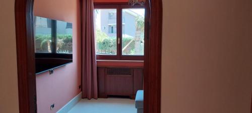 a view of a room with a window at Villa Giulia in Siracusa