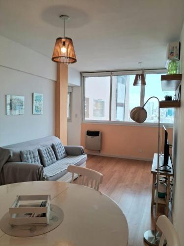 a living room with a couch and a table at Recoleta - Fantástico departamento in Buenos Aires