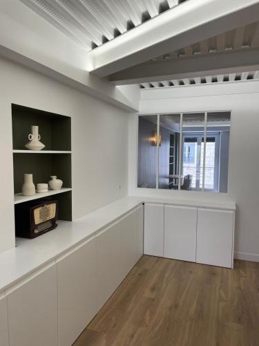 Photo de la galerie de l'établissement 4 pièces Charme Paris Centre, à Paris