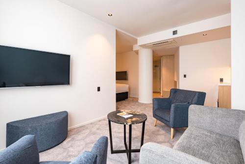 TV a/nebo společenská místnost v ubytování Legacy Airedale Hotel Auckland