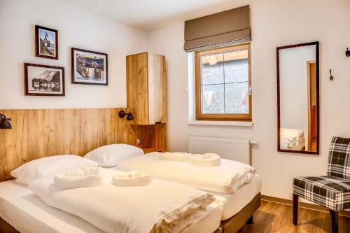 Posteľ alebo postele v izbe v ubytovaní Holiday Homes Obertraun - Oberösterreich 86