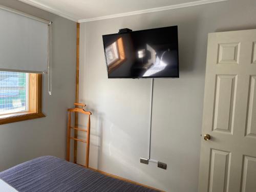 TV a/nebo společenská místnost v ubytování Precioso departamento en Excelente Ubicación en Puerto Montt