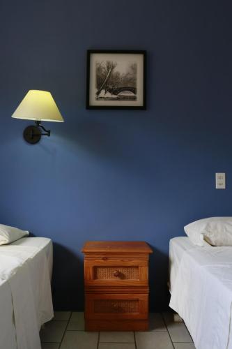 Llit o llits en una habitació de Hersher Studio's & Apartments