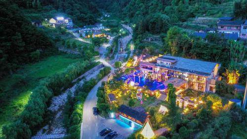 an aerial view of a mansion at night at Pandora Vista Retreat in Zhangjiajie