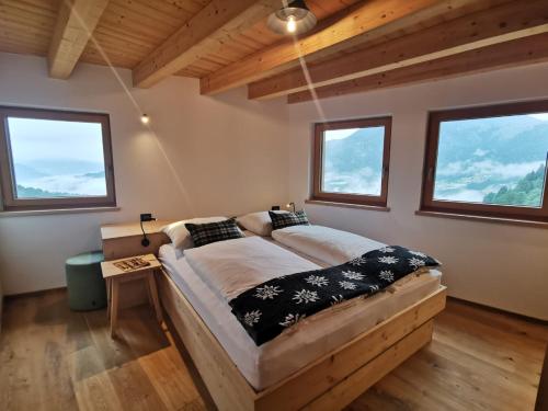 Postel nebo postele na pokoji v ubytování LARIS mountain house