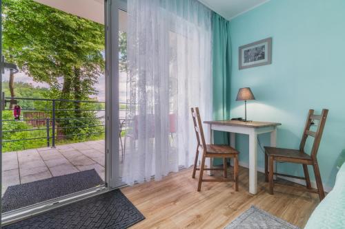 Balkón nebo terasa v ubytování Kurka Wodna - Apartamenty na Mazurach