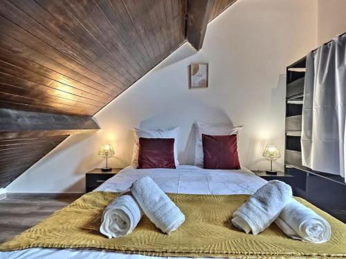 Ένα ή περισσότερα κρεβάτια σε δωμάτιο στο Maison Lumineuse et Moderne Paris Disney