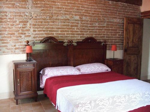 מיטה או מיטות בחדר ב-Casa Di Alfredo B&B - CITR9039