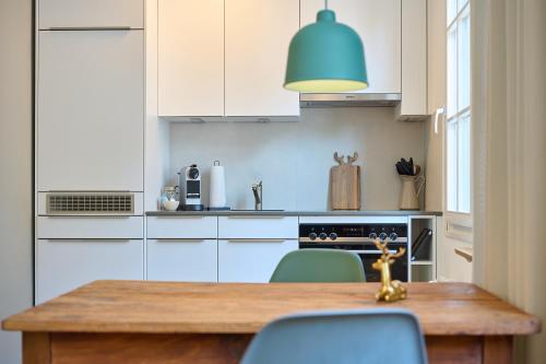Kuchyň nebo kuchyňský kout v ubytování RIVERSIDE - APARTMENTS BASEL deluxe