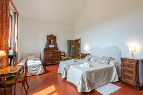 Ένα ή περισσότερα κρεβάτια σε δωμάτιο στο Fienile