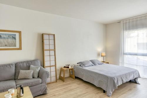 Postel nebo postele na pokoji v ubytování Loft Palamós