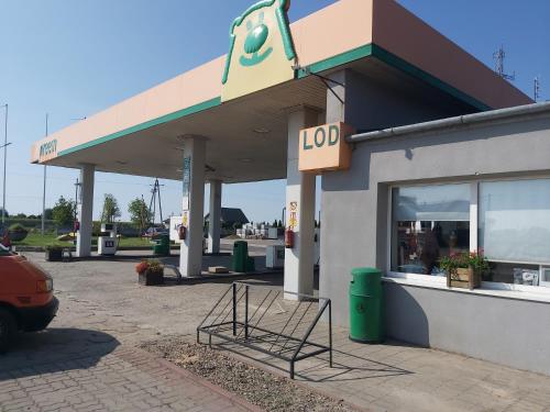 a gas station with a sign on it at Stacja Ketmia in Plecka Dąbrowa