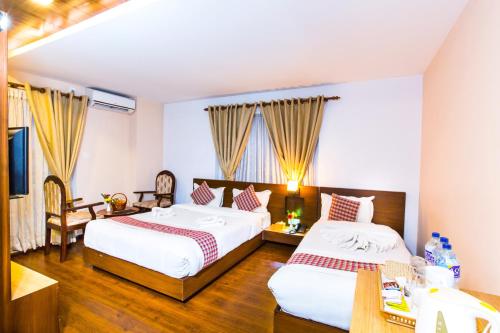 Kathmandu Suite Homeにあるベッド