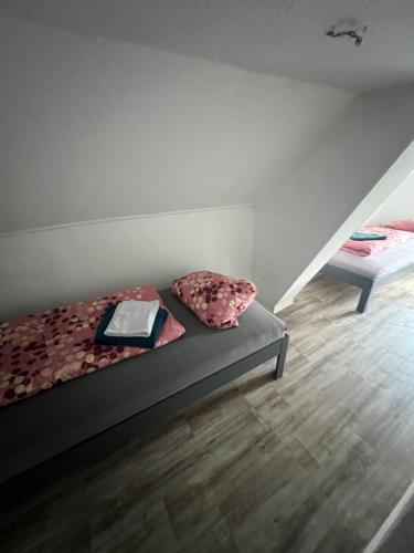 Postel nebo postele na pokoji v ubytování Pension und Monteurzimmer Schwarzer Adler