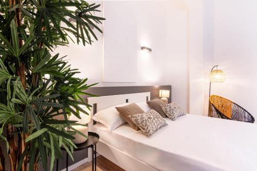 Postel nebo postele na pokoji v ubytování Diletti Rooms