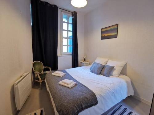 En eller flere senge i et værelse på Nouvelle pépite - Le Rayon vert