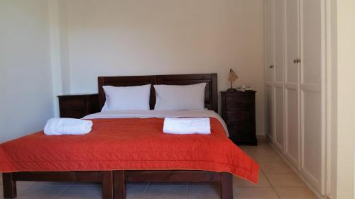 Postel nebo postele na pokoji v ubytování PHILIPPOS Hotel Apartments