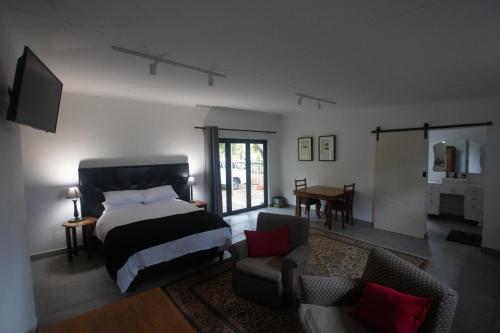 Кровать или кровати в номере Cottage in Nelspruit