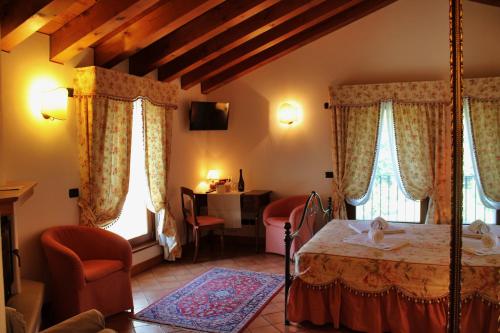 Postel nebo postele na pokoji v ubytování Agriturismo Al Credazzo