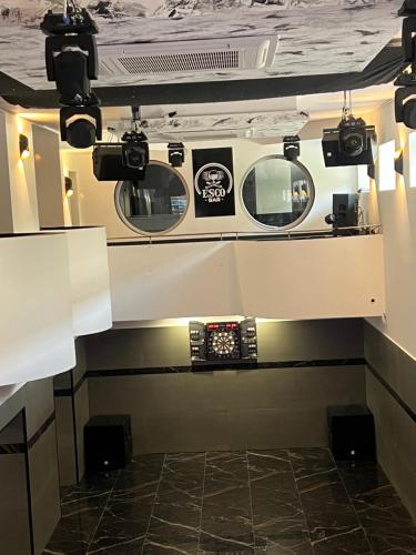 a view of a room with a tv and cameras at Dream Home in Szentes
