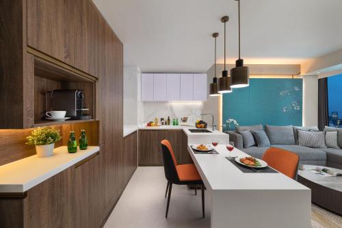 Ein Sitzbereich in der Unterkunft Ascott North Point Hong Kong