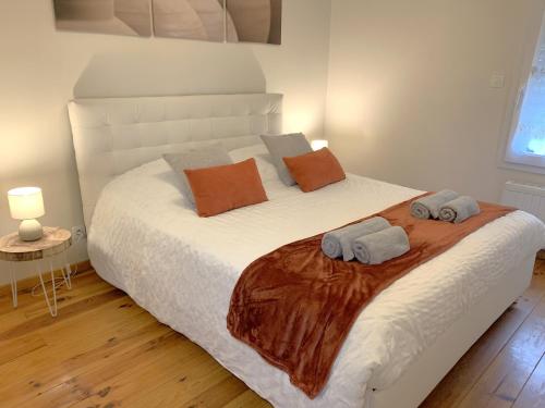 Postel nebo postele na pokoji v ubytování Appartement spacieux au calme