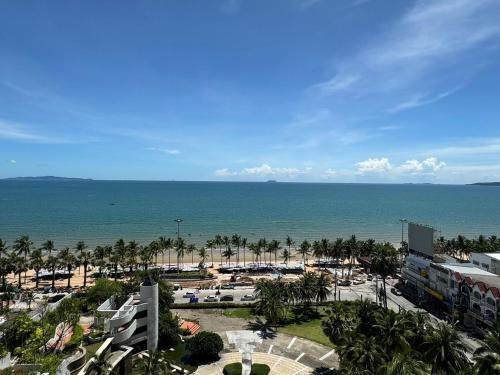a view of the ocean from a resort at Jomtien Beachfront Apartment in Jomtien Beach