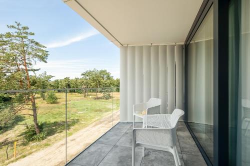 O grădină în afara Sea&Lake Studia z Parkingiem w Mielnie by Noclegi Renters