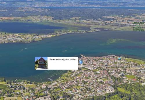 an aerial view of a lake and a city at Platz zum Wohlfühlen „cook&chill“ in Ermatingen