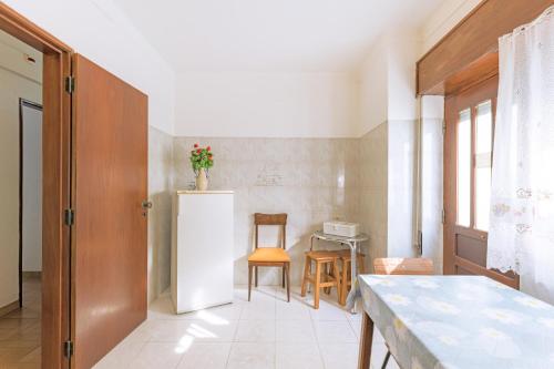 Ένα ή περισσότερα κρεβάτια σε δωμάτιο στο Quartos Malveiro