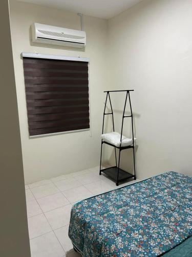 Katil atau katil-katil dalam bilik di SKV Homestay