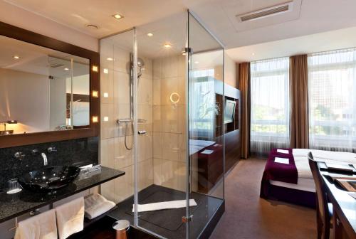 Koupelna v ubytování Flemings Selection Hotel Frankfurt-City